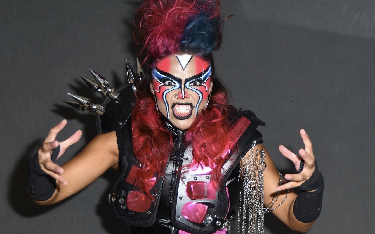 Cosplayhem performer in spiked armor and face paint